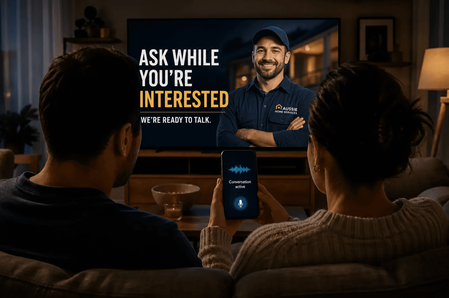 A couple immediately starting a voice conversation after becoming interested in a television advertisement
